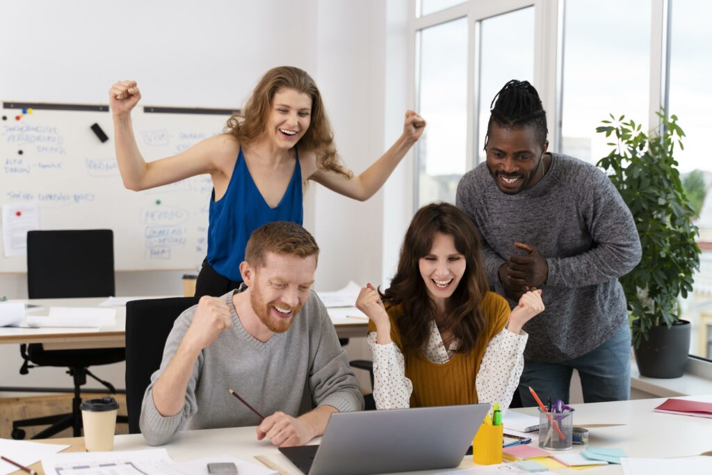 medium shot successful-workers celebrating